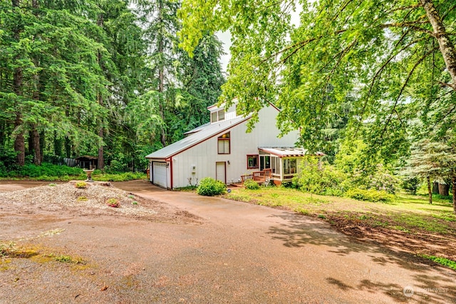 view of front of property with a garage