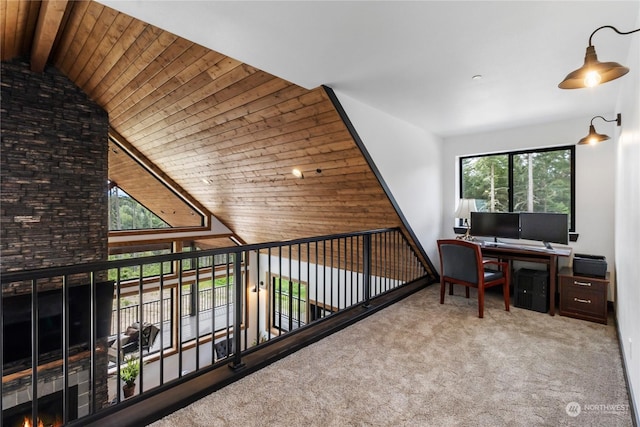 office featuring carpet flooring, lofted ceiling with beams, and wood ceiling