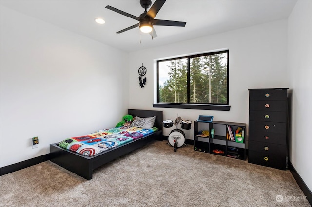 bedroom featuring ceiling fan and carpet floors