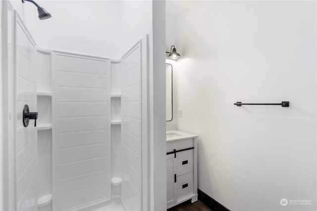 bathroom with vanity and walk in shower