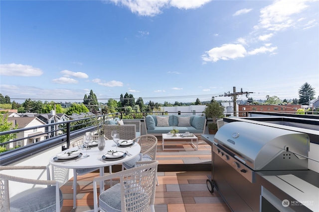 view of patio with a grill, an outdoor hangout area, and a balcony