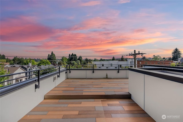 patio terrace at dusk with a balcony