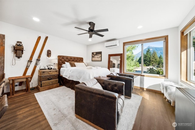 132 Hellem Dr, Packwood, WA 98361 - bedroom featuring a wall mounted air conditioner, dark wood-style floors, multiple windows, recessed lighting, and ceiling fan