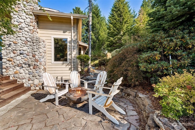 132 Hellem Dr, Packwood, WA 98361 - view of patio with a fire pit
