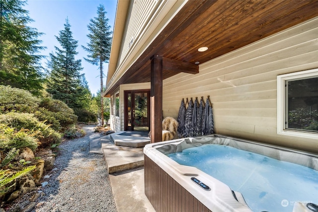 132 Hellem Dr, Packwood, WA 98361 - view of patio / terrace with a hot tub