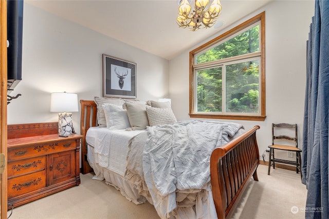 132 Hellem Dr, Packwood, WA 98361 - bedroom featuring a chandelier, light carpet, and vaulted ceiling