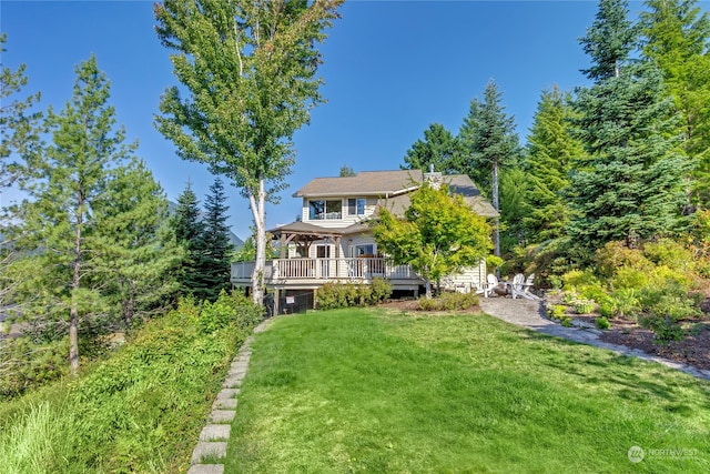 132 Hellem Dr, Packwood, WA 98361 - rear view of property with a lawn and a deck