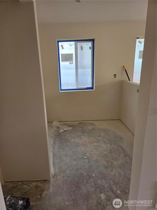 empty room featuring concrete floors
