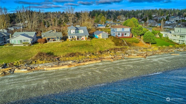 drone / aerial view with a water view