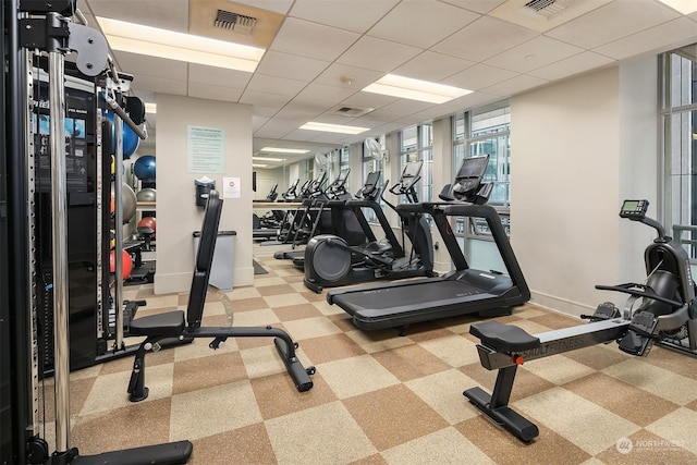 workout area with a drop ceiling