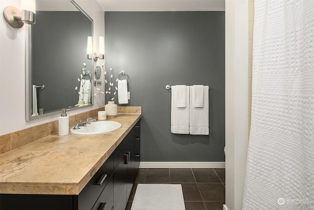 bathroom with vanity and tile patterned floors