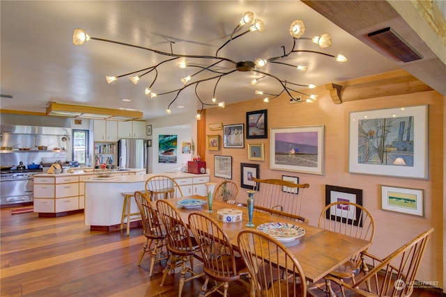 dining space featuring dark hardwood / wood-style flooring