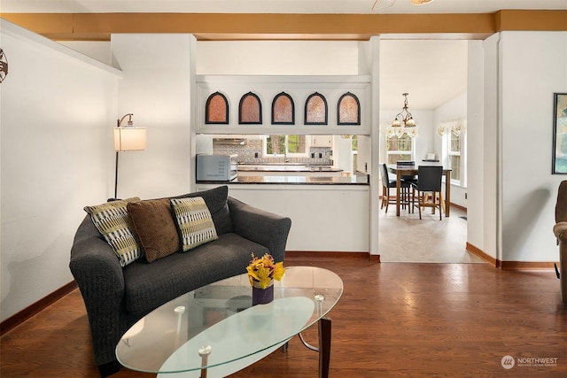 81 Hawthorn Ln, Easton, WA 98925 - living area featuring a chandelier and dark wood finished floors