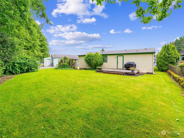 view of yard featuring a deck