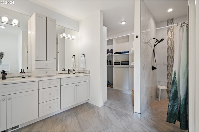 bathroom with vanity and a shower with shower curtain