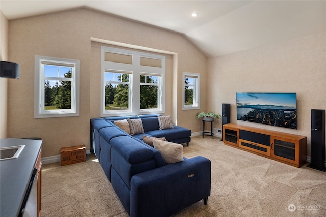 living room featuring light carpet and lofted ceiling