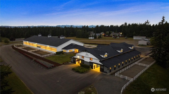 6504 44th Ave NE, Olympia, WA 98516 - aerial view of property and surrounding area with a heavily wooded area