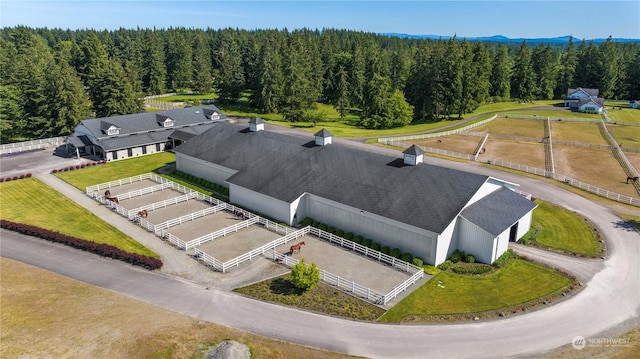 6504 44th Ave NE, Olympia, WA 98516 - aerial view of property and surrounding area featuring a heavily wooded area and mountains