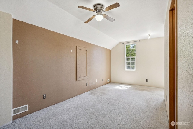 bonus room with carpet floors, ceiling fan, and lofted ceiling