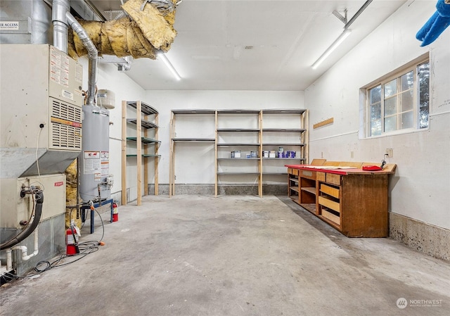 basement with a workshop area and gas water heater