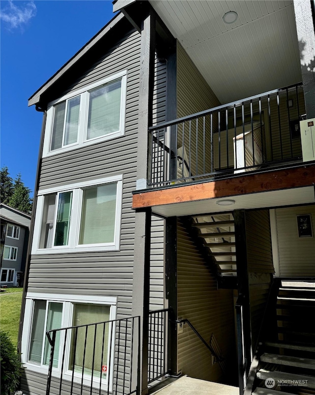 view of home's exterior featuring a balcony