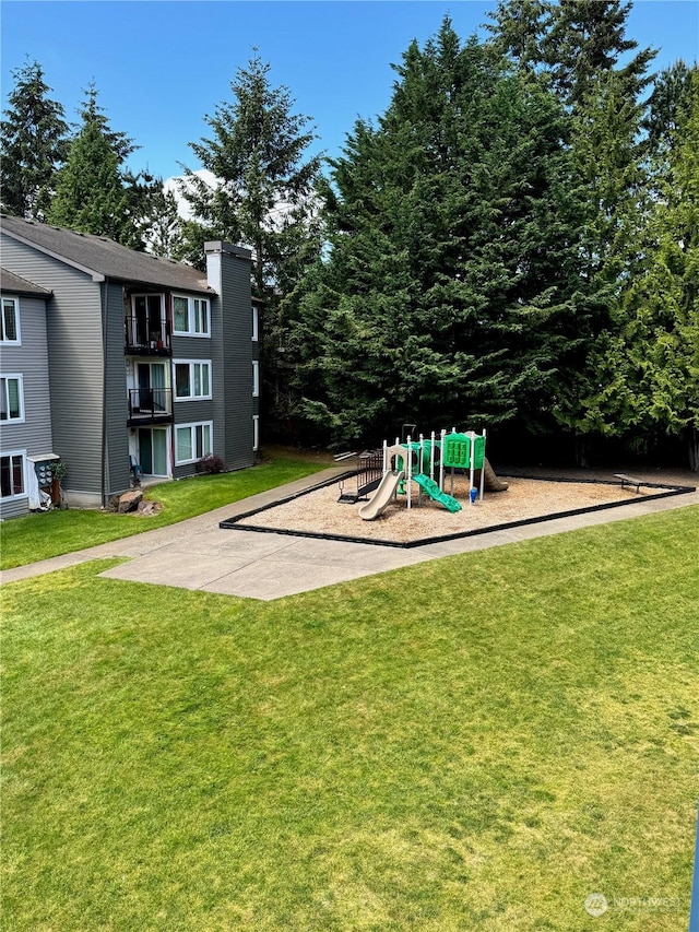 view of jungle gym featuring a yard