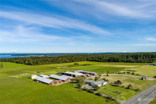 birds eye view of property featuring a rural view