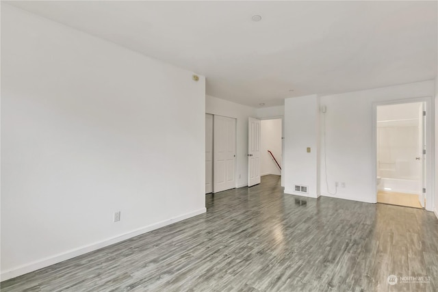 spare room with light hardwood / wood-style floors