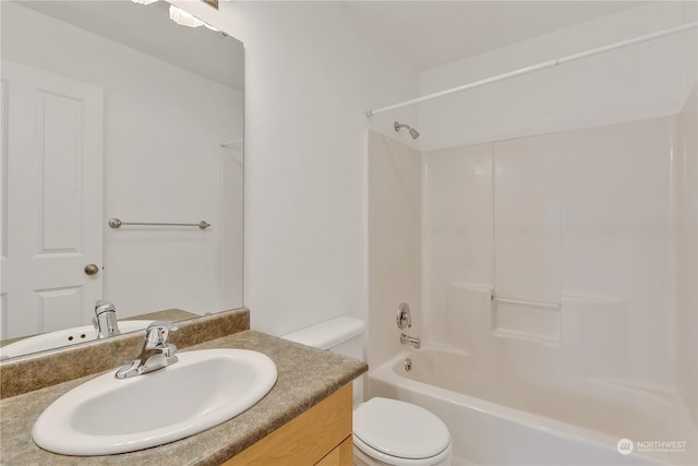 full bathroom with vanity, toilet, and tub / shower combination