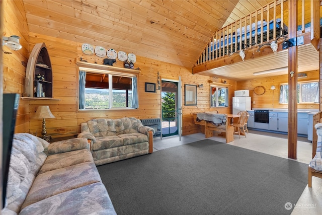 living room featuring high vaulted ceiling, wooden ceiling, and wooden walls