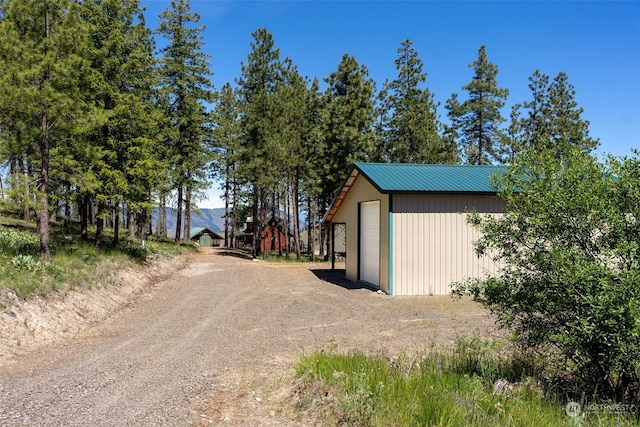 view of shed / structure featuring a garage