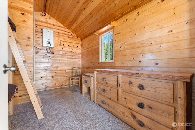 bathroom with water heater, wood walls, wood ceiling, and lofted ceiling