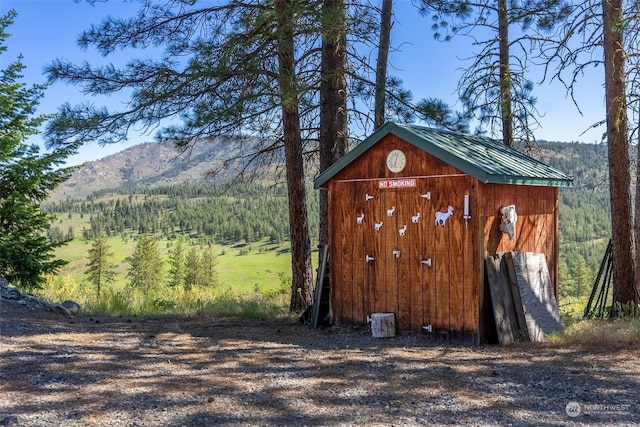 view of outdoor structure with a mountain view