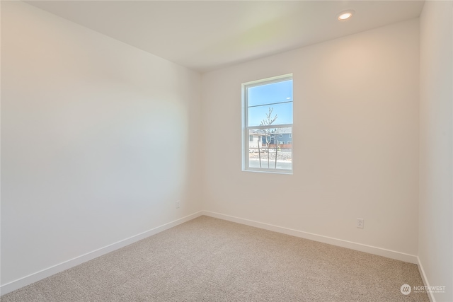 unfurnished room with carpet