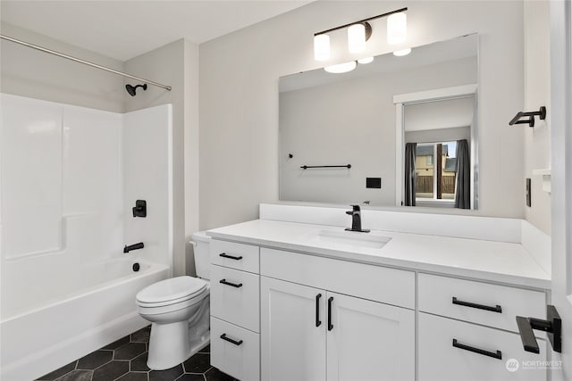 full bathroom with shower / bathing tub combination, tile patterned floors, vanity, and toilet