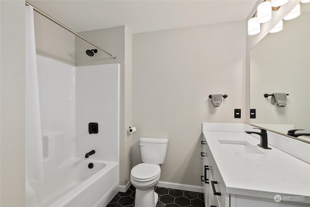 full bathroom with bathing tub / shower combination, vanity, tile patterned flooring, and toilet