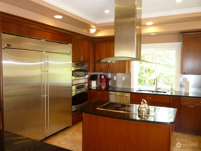 kitchen with a center island, appliances with stainless steel finishes, island exhaust hood, sink, and light tile flooring