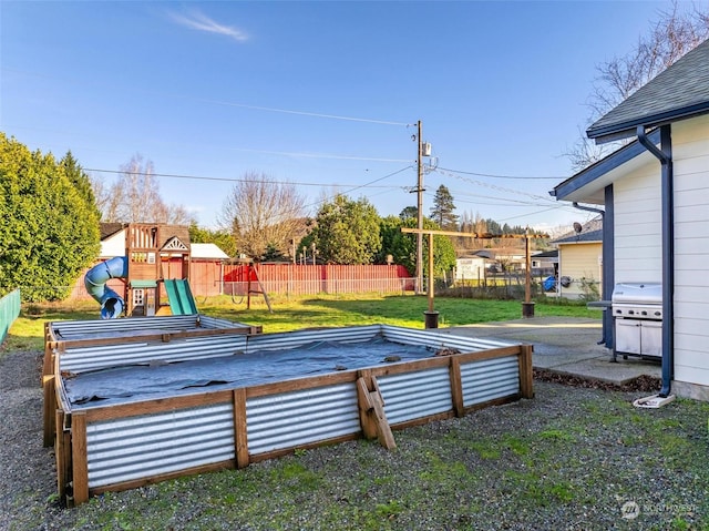 view of yard with a playground