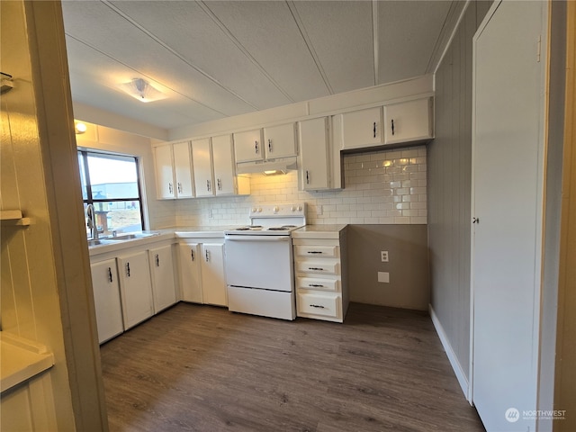 kitchen with tasteful backsplash, white cabinetry, dark wood-type flooring, white electric range oven, and sink