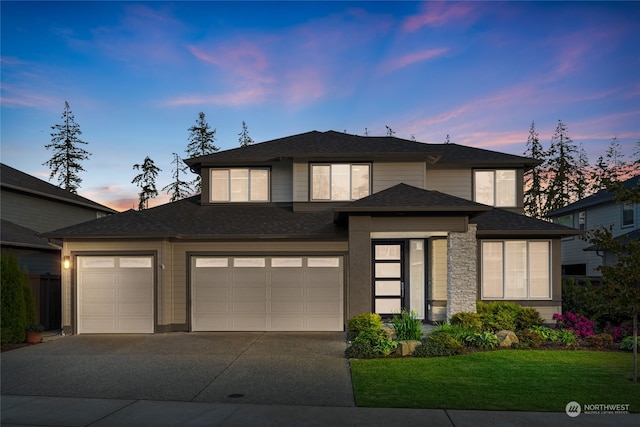 prairie-style home featuring a lawn