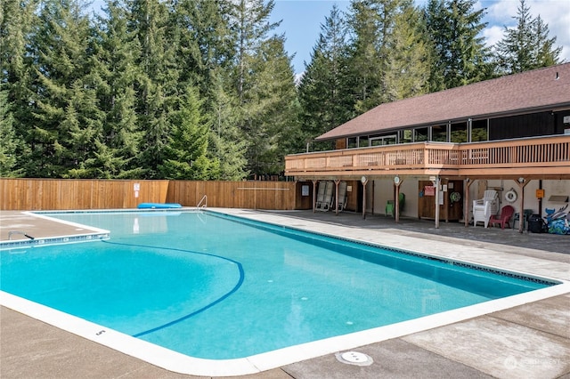 view of swimming pool with a patio