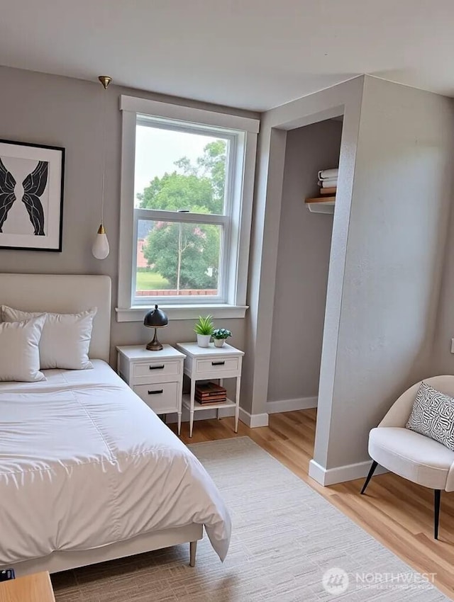 14607 Union Ave SW, Lakewood, WA 98498 - bedroom featuring light wood-type flooring and baseboards