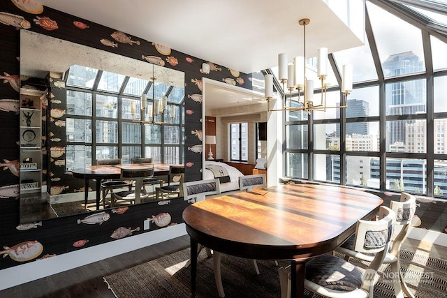 dining room with plenty of natural light and a chandelier