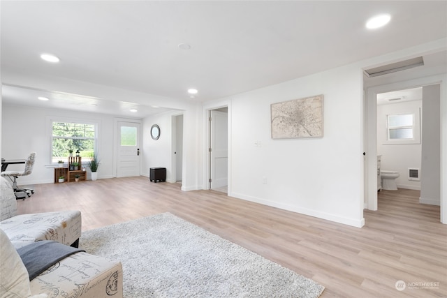 living room with light hardwood / wood-style floors