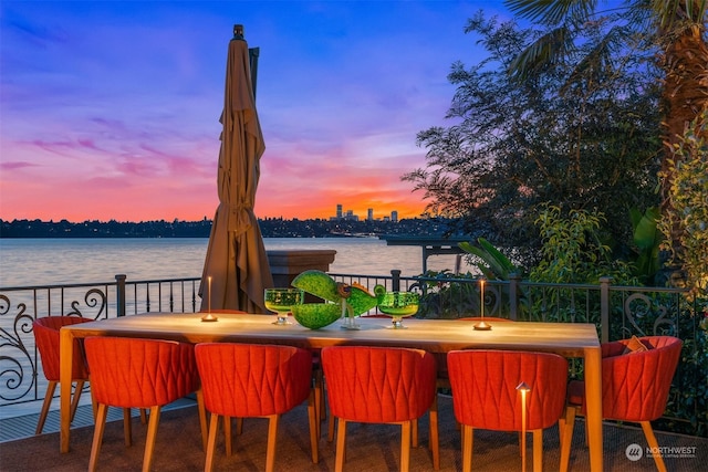 deck at dusk with a water view