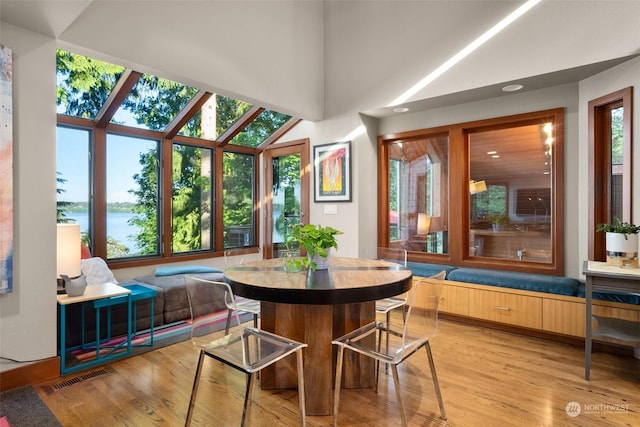 sunroom with a water view