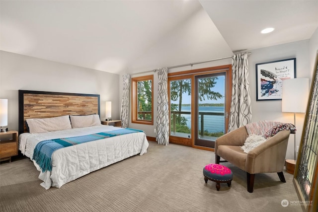 carpeted bedroom with a water view, access to outside, and vaulted ceiling