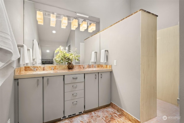 bathroom with vanity and walk in shower