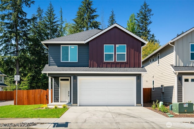 11118 NE 91st Ave, Vancouver, WA 98662 - traditional-style house featuring driveway, an attached garage, board and batten siding, and fence
