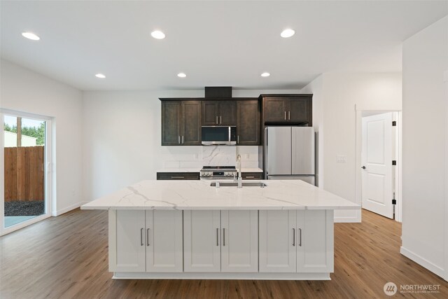 11118 NE 91st Ave, Vancouver, WA 98662 - kitchen with a sink, baseboards, stainless steel appliances, and light wood-type flooring